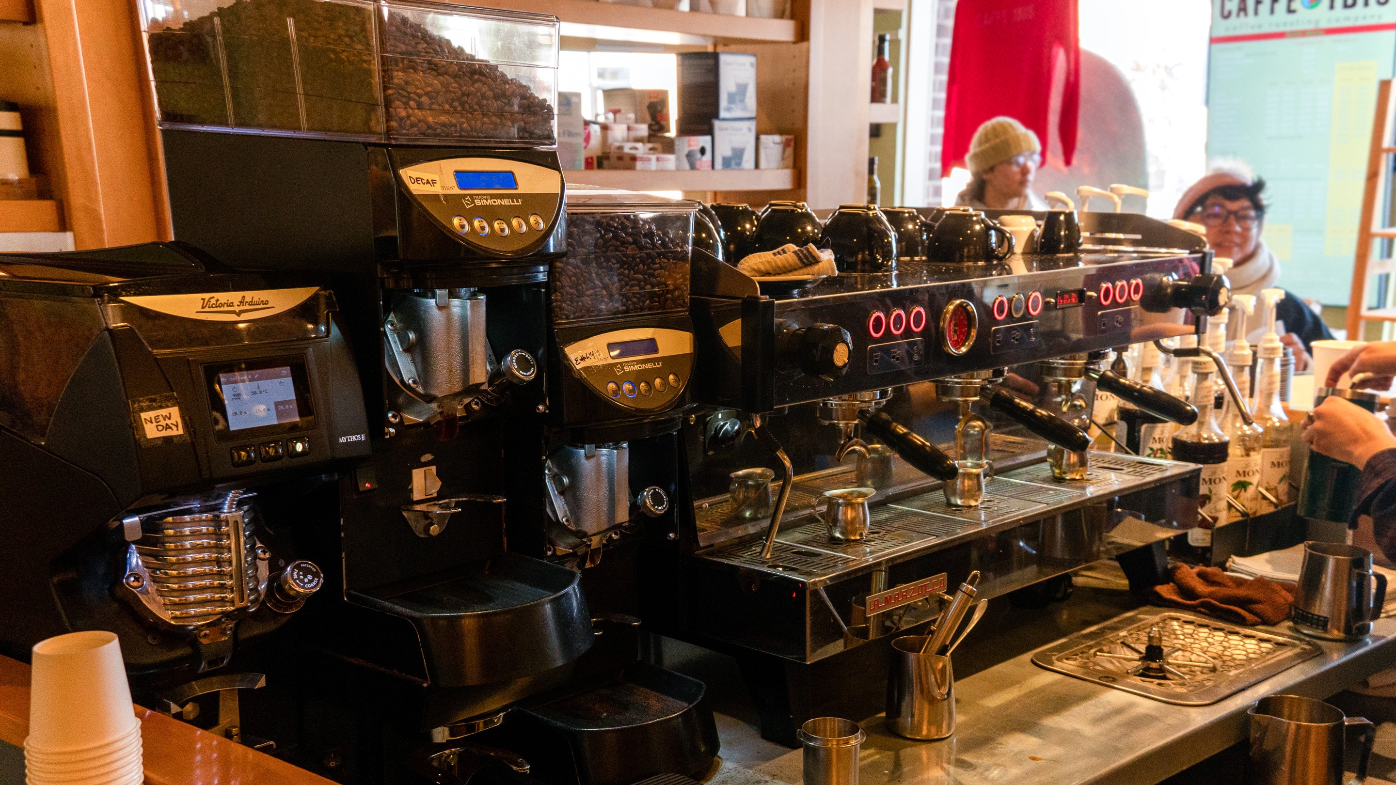 View of espresso bar from the baristas perspective in the Caffe Ibis Cafe Gallery in downtown Logan, UT.
