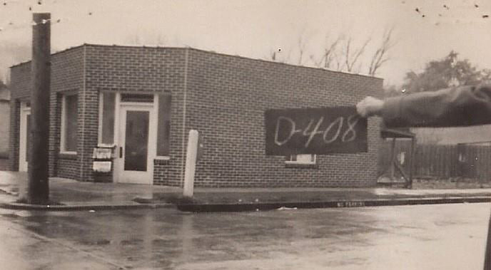 Old property image of the building where the Caffe Ibis Gallery Cafe is now located in downtown Logan.