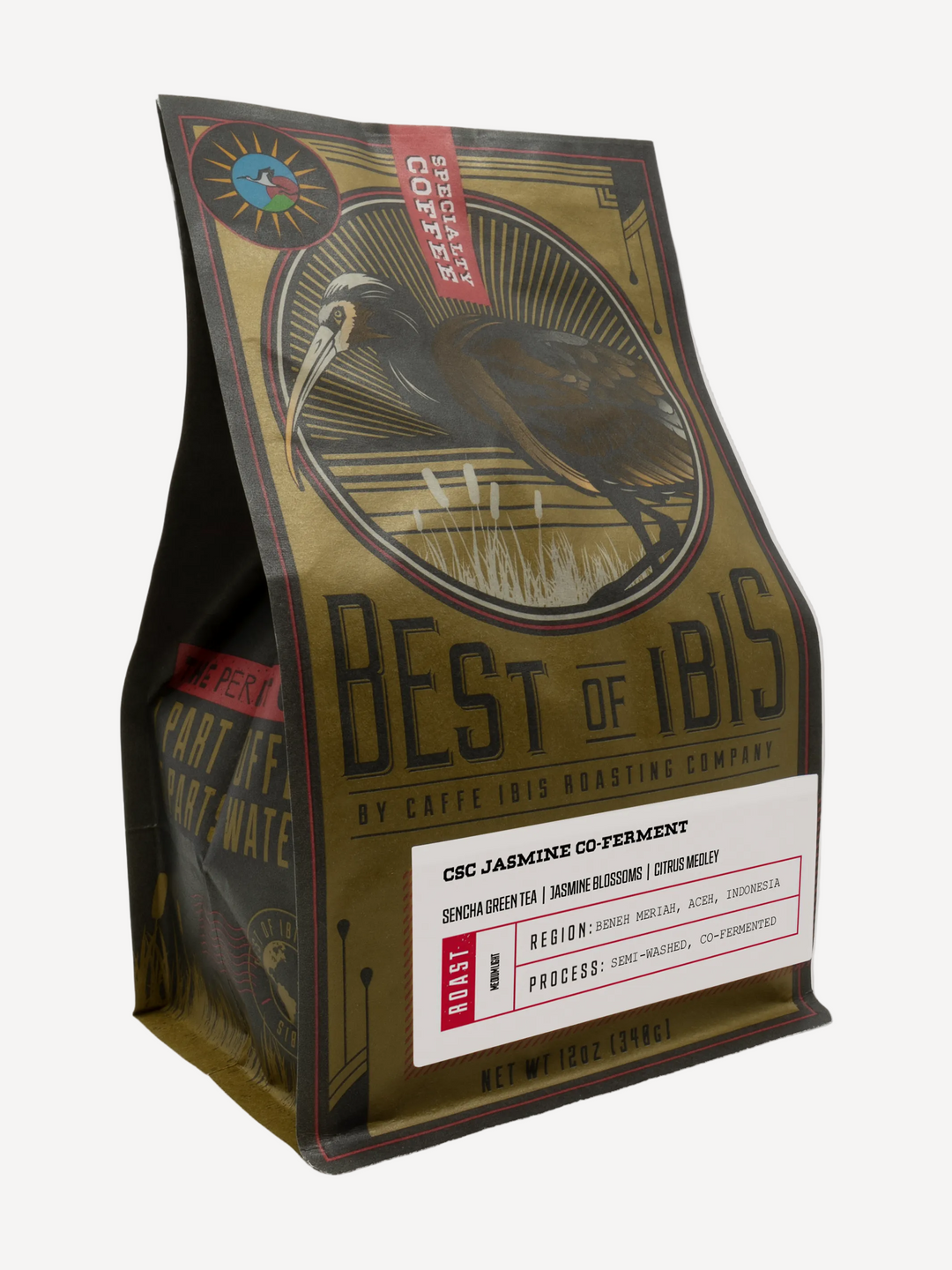 A bag of Best of Ibis Roasting Company C2C Jasmine Green Tea Arabica coffee, featuring a vintage-style illustration of a white-faced Ibis on a black and gold background with a white label at the bottom with coffee details. 