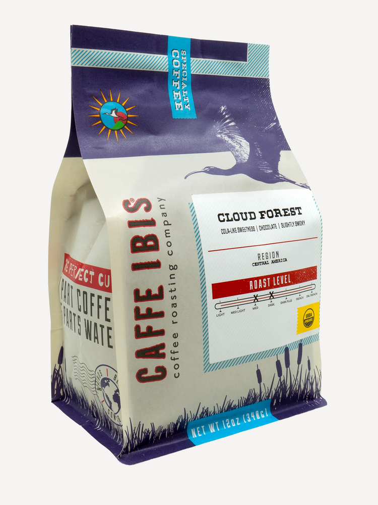 Caffe Ibis Organic Cloud Forest coffee in a purple twelve ounce bag; front quarter view.