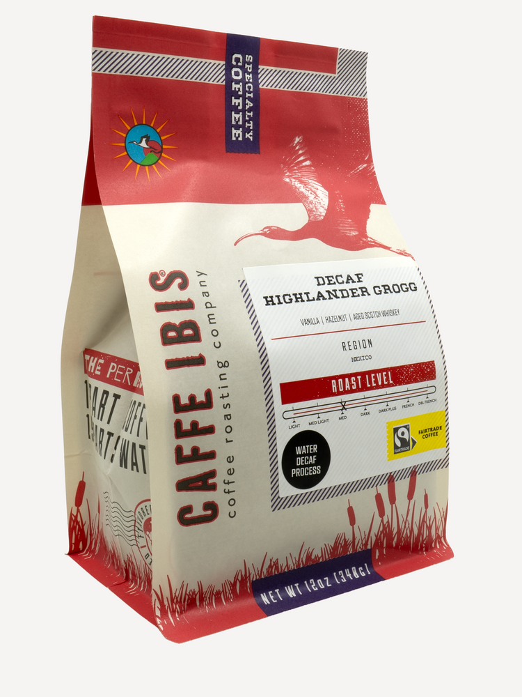 Caffe Ibis Decaf Highlander Grogg flavored coffee in a red twelve ounce bag; front quarter view.