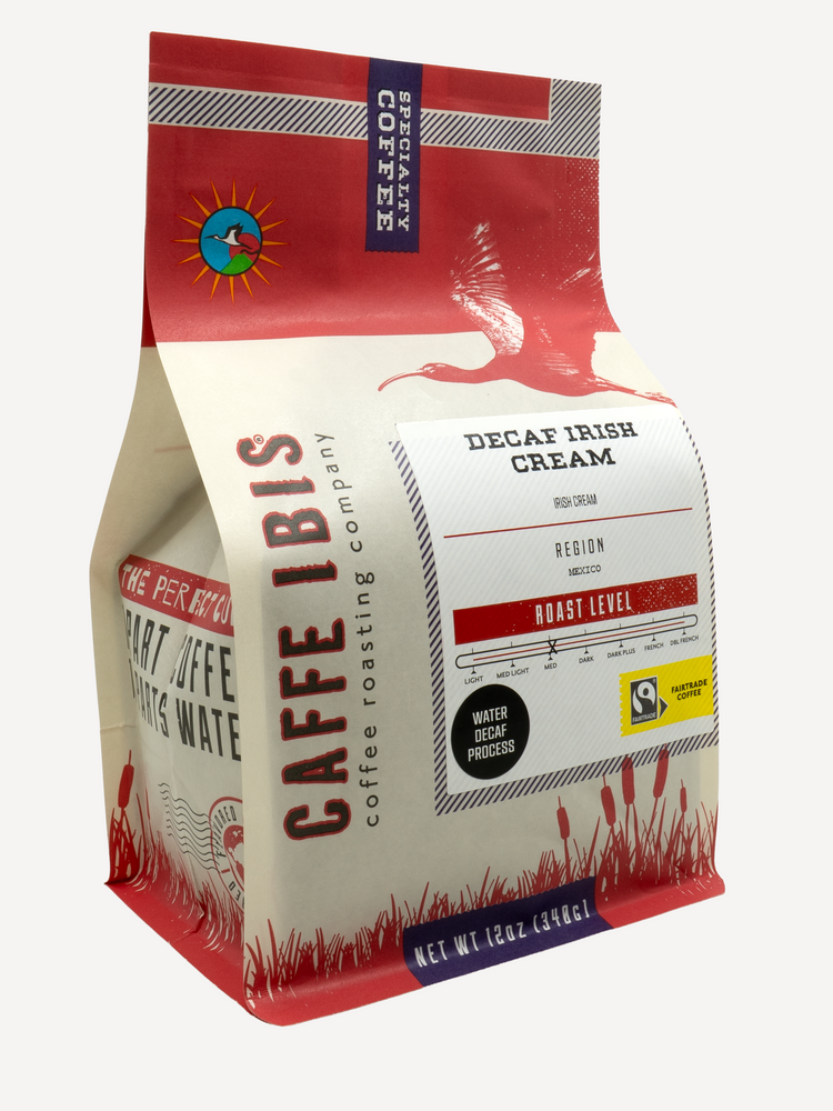 Caffe Ibis Decaf Irish Cream flavored coffee in a red twelve ounce bag; front quarter view.