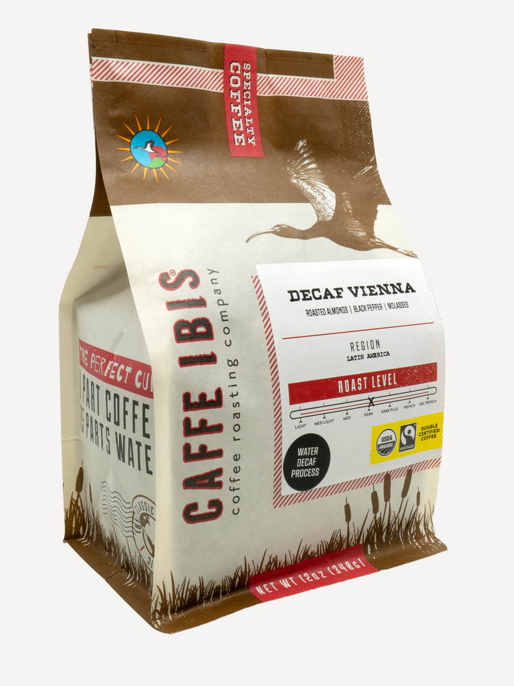 Caffe Ibis Organic Decaf Vienna Roast coffee in a brown twelve ounce bag; front quarter view.