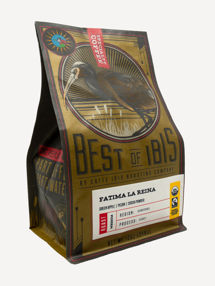 Caffe Ibis Organic Fatima La Reina coffee in a gold and brown twelve ounce bag; front quarter view.