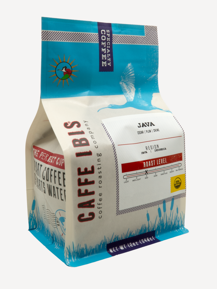 Caffe Ibis Organic Java coffee in a blue twelve ounce bag; front quarter view.