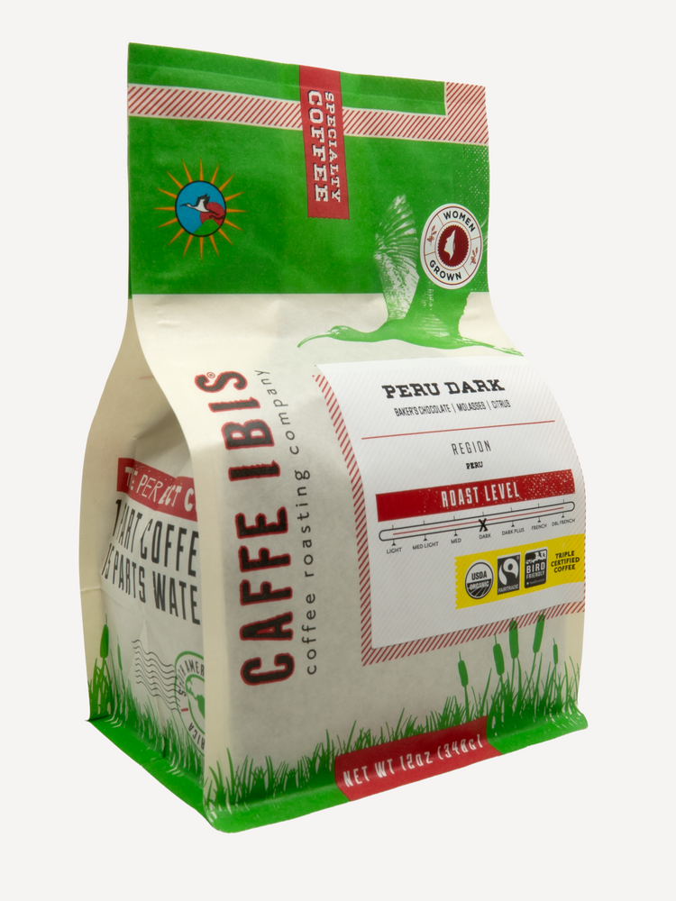 Caffe Ibis Organic Peru Dark in a green twelve ounce bag; front quarter view.