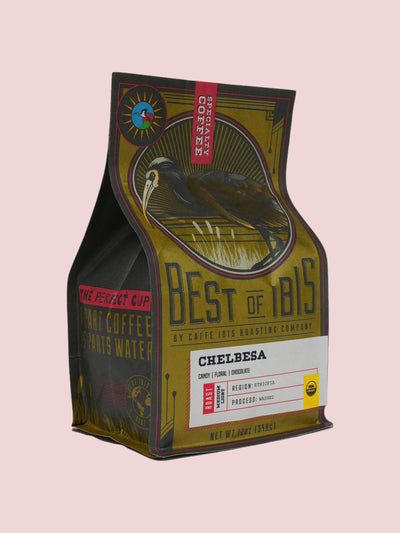 Caffe Ibis Organic Chelbesa coffee in a Best of Ibis twelve ounce bag; front quarter view.
