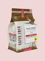 Caffe Ibis Organic Decaf Vienna Roast coffee in a brown twelve ounce bag; front quarter view.