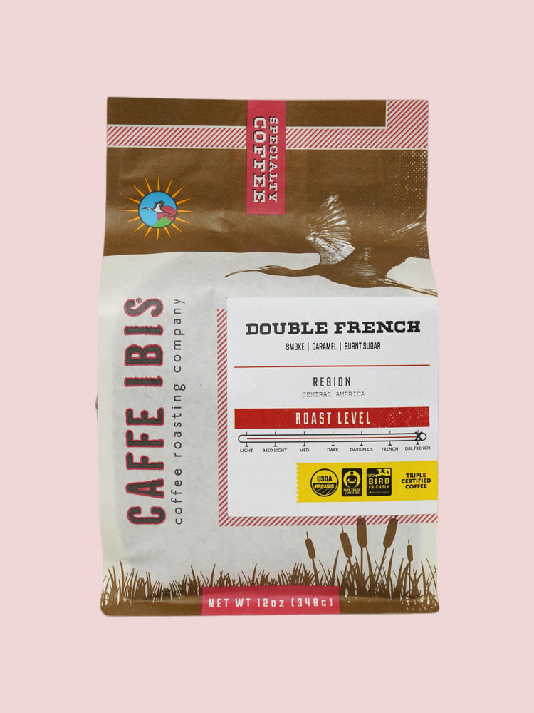 Caffe Ibis Organic Double French Roast coffee in a brown twelve ounce bag; front quarter view.