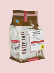 Caffe Ibis Organic Escalante Canyons coffee in a brown twelve ounce bag; front quarter view.