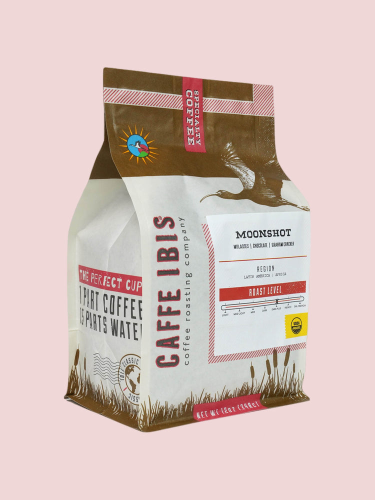 Caffe Ibis Organic Moonshot coffee in a brown twelve ounce bag; front quarter view.