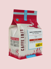Caffe Ibis Organic San Fernando coffee in a red twelve ounce bag; front quarter view.