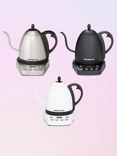Three bonavita interurban series electric kettles in matte white, matte black, and stainless steel.