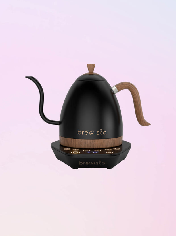 https://www.caffeibis.com/cdn/shop/products/brewista-artisan-kettle-black-on-black-woo-accents_620x.jpg?v=1668396786